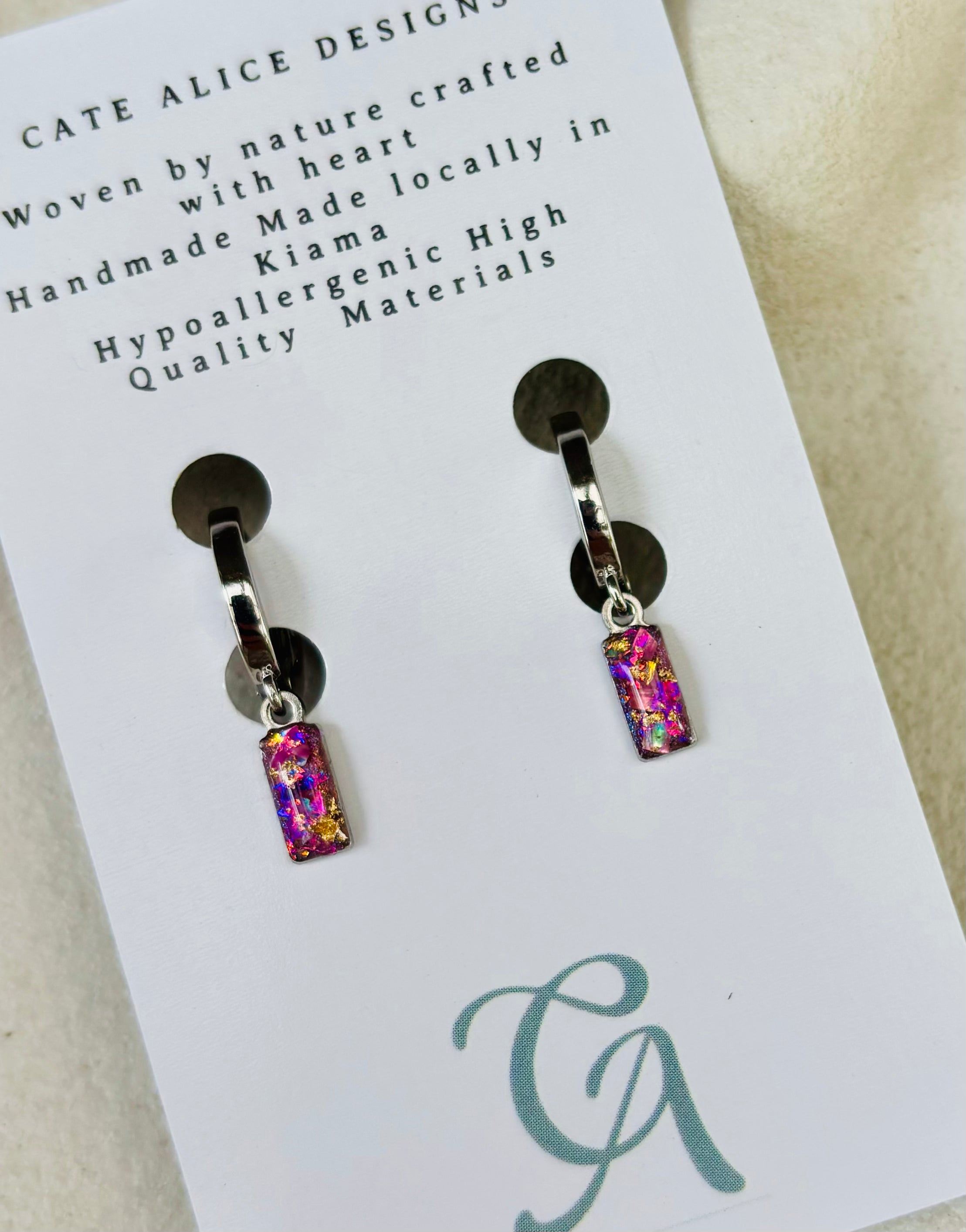 Fuchsia Glow Silver Huggie